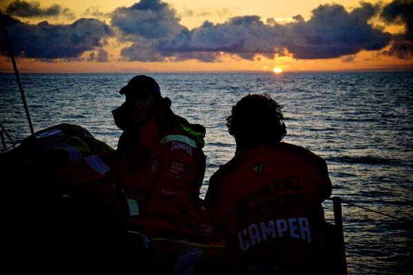 Sunset aboard CAMPER as they wait for the heavy weather